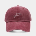 Close-up of a burgundy washed cotton baseball cap featuring white dolphin embroidery - Adjustable / Burgundy
