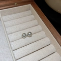 Elegant pair of grey pearl stud earrings set in a wooden jewelry display box - Gray (8mm)