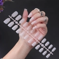 Matte nude pink long square press-on nails displayed on a model with silver rings - Matte Nude Pink