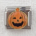 Macro view of silver modular bracelet link with orange enamel Halloween pumpkin design - Orange Pumpkin