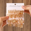 Golden fashion jewelry set with pearl earrings and hoops on a white card display - KC Gold (A-1007)