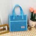 Sky blue mesh travel tote bag with breathable texture and black snap button closure - Blue