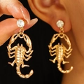 Gothic gold scorpion earrings with crystal rhinestones on model and hand view - Scorpion Pendant Style (N-947) / Gold