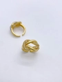 Detailaufnahme goldener Knotringe mit funkelndem Zirkonia-Besatz und offener Form - Ring / Gold