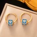 Golden round hoop earrings with blue evil eye heart cube charms in luxury gold finish - [G3114] Gold Dark Blue Heart Cube Earrings