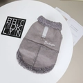 Detail of grey suede pet vest featuring warm fleece trim and a sturdy metal D-ring attachment - Peach-skin Velvet Pet Vest - Gray
