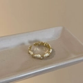 Adjustable golden ring featuring white enamel hearts and clear crystals on ceramic plate - Heart White Enamel