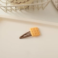Close-up of cute square biscuit hair clip with realistic resin soda cracker detail - BB Clip Biscuit-Square