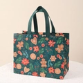 Christmas gift bag in dark green non-woven fabric with gingerbread and floral prints - Christmas Style 28