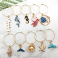 Detailed set of 10 ocean-themed charms featuring seahorses and shells for DIY jewelry - Enamel Ocean Series-HK505