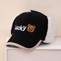 Cappello invernale Lucky bear con paraorecchie in tessuto trapuntato nero e pile - Bambini circa 3-10 anni / Nero