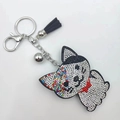 Cartoon cat keychain with white rhinestones, black tassel and silver metal ring - Multi-color