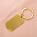 Portachiavi con piastrina rettangolare in acciaio inossidabile dorato su raso rosa - Oro