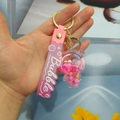 Pink liquid bear keychain with moving glitters and a pink Bubble strap attachment - Gradient Strap + Bear / Pink