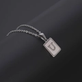 Silver square pendant necklace with white shell inlay and metal letter U detail - Silver Letter U