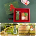 Christmas candle gift box featuring Santa and snowflake shapes with British Pear scent - Longjing Tea Gift Set