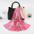 Floral print chiffon scarf in rose pink draped on a luxury black leather handbag - Rose Red (XQ366)