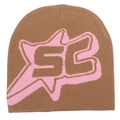 Detailed close-up of brown knit beanie featuring pink SB letter embroidery and star pattern - Khaki