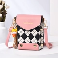 Pink and black quilted crossbody bag with a cute tiger charm and adjustable strap - Lattice Pink