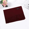 Solid burgundy cashmere scarf with tassels and material label on white background - Burgundy