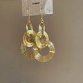 Close-up of gold-colored multi-layer circular hoop earrings with a textured metal finish - Ear Hook Gold Multi-layer Round Rings