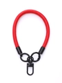 Close-up of a red leather phone wrist strap with sturdy black metal ring connectors - Red