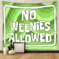 Detail view of Bohemian wall tapestry with green wavy patterns and bold text decor - Green Swirl