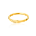Close-up of minimalist gold ring band featuring clear 999 engraving on flat surface - US 10 / 999