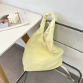 Detail of light yellow textured shoulder bag with pleated bubble fabric texture on a desk - Pale Yellow