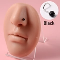 S-shaped black crystal paved stainless steel nose stud on a silicone model display - 0.8x7x3mm / S-Shape Black