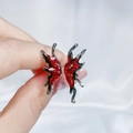 Close-up of red enamel butterfly stud earrings with silver liquid metal finish - Asymmetric Wing Style Open Ring (JZ3748)