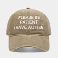 Detail of khaki cotton baseball cap with embroidered PLEASE BE PATIENT I HAVE AUTISM text - Adjustable / Khaki