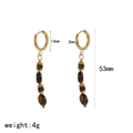 Detail view of gold hoop earrings with brown resin beads and 53mm length dimensions - Beaded Hoop Style (TE60634)