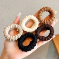 Five elastic ribbed hair ties in earthy tones like beige and brown on a palm - Set of 5 / 2# Mixed Colors (Single Outer Dia Approx 4cm Width 1.7cm)