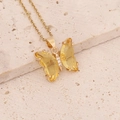 Macro shot of gold butterfly necklace with yellow faceted gems and tiny white crystals - 7# Yellow