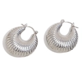 Polished silver croissant style hollow earrings with a textured corrugated pattern design - Steel