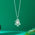 Macro shot of silver stainless steel necklace with hollow Santa Claus pendant detail - Santa Claus / Silver