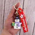 Christmas snowman PVC keychain with purple scarf and gift box accessory - Christmas Snowman-13
