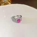 Macro view of a 925 silver ring featuring a pink oval gemstone and hollow pave setting - Style 19 Silver (Pink Oval Gemstone)