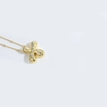 Gold-tone necklace with a cross pendant featuring white cubic zirconia pavé setting - Style X