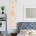 Bohemian moon phase wall tapestry with celestial sun and star patterns and fringe - Starry Sky - Pink