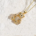 Golden bear pendant necklace with white cubic zirconia and black gemstone eyes - Gold/White Zirconia