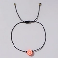 Bracciale nero intrecciato a mano con ciondolo a fetta d'arancia e perle dorate - Arancione