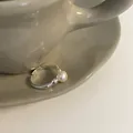 Adjustable silver ring with white pearl on ceramic saucer, minimalist vintage style - Silver Band With Single Pearl Ring (J3928)