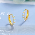 Elegant gold-plated hoop earrings featuring round opal stones in a minimalist design - Gold
