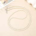 Detailed view of white faux pearl strap with silver lobster clasps for bags and phones - K592 8mm Pearl Crossbody (Silver Lobster Clasp)