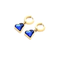 Close-up of heart-shaped blue crystal drop earrings with golden circular hoops - Gold Blue Zirconia