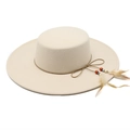 Close-up of wool boater hat with leather cord, colorful beads, and natural feather detail - M (56-58cm) / Beige
