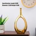 Moderne holle druppelvormige gouden keramische vaas met glanzende afwerking, 31 cm hoog - Groot / Goud