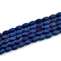 Macro view of blue geode agate drum beads showing natural porous texture and detail - Drum Bead 8*12mm (16 Beads Length 200mm) / Electroplated Blue